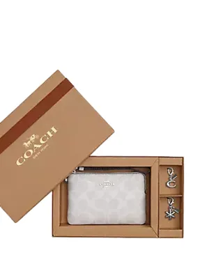 Coach Boxed Corner Zip Wristlet In Signature Canvas Coach Bags