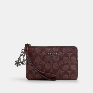 Coach Outlet Boxed Corner Zip Wristlet In Signature Canvas With Charms COACH Outlet Bags