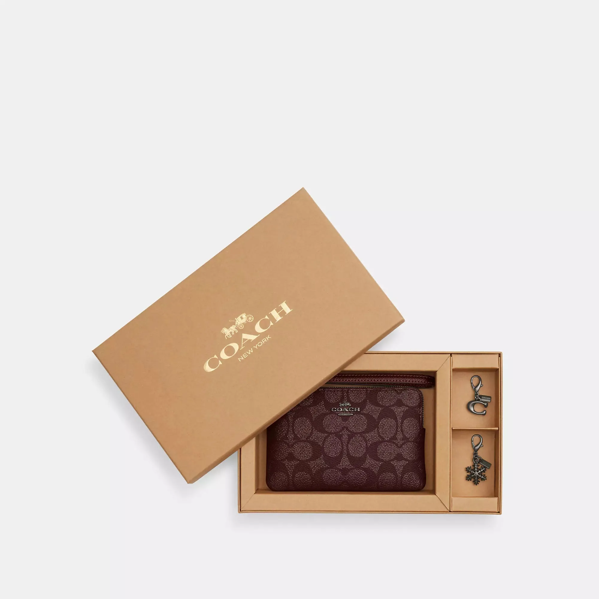Coach Outlet Boxed Corner Zip Wristlet In Signature Canvas With Charms COACH Outlet Bags